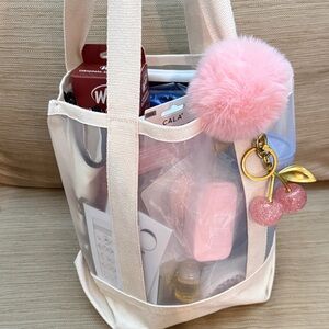 Madewell mesh tote filled with nwt items